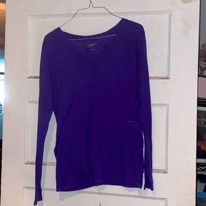 Purple long sleeve tee.